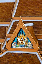 Ornate roof seen from the upper steps of the Golden Buddha (Sukhothai Traimit) temple in Bangkok. Thailand, September 2014.