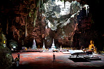 Buddhist shrine in Khao Luang Cave, Phetchaburi. Thailand, September 2014.
