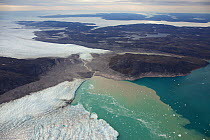 Aerial view of the Sermeq Kujalleq Glacier or Jakobshavn Isbrae, entering the sea, near Ilulissat, UNESCO World Heritage Site, Kalaallit Nunaat, Greenland. August 2014. Photographed for The Freshwater...