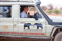 Iain Douglas-Hamilton coordinating research efforts for Save the Elephants, Kenya. Model released.