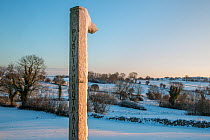 Public footpath sign in winter near Bonsall, Peak District National Park, Derbyshire. December 2014.