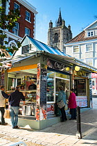 Fresh Fish market stall in Norwich, Norfolk. St Peter Mancroft church tower in background, Norfolk, UK. November 2014.