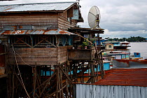 Singkawang, houses on the Kapuas riverside, West Kalimantan, Indonesia Borneo. June 2010.
