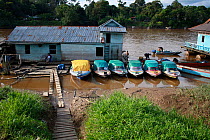 Boats on Kapuas River, Singkawang,  West Kalimantan, Indonesia Borneo. June 2010.