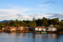 Village along the Kapuas river, Singkawang,  West Kalimantan, Indonesia Borneo. June 2010.