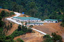 Tempory houses for Dayak people evicted for dam construction. Sabah, Malaysian Borneo. July 2010.