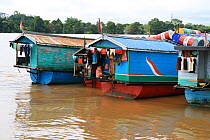 House boats on River Kapuas, outside Singkawang, West Kalimantan, Indonesian Borneo. July 2010.