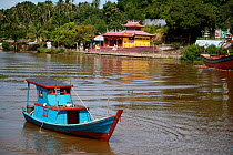 Bright blue boat, Singkawang, West Kalimantan, Indonesian Borneo. July 2010.