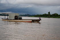 Boat used for transport of goods on river, Balipapan, East Kalimantan. Borneo. June 2010.