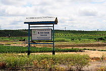 Sign for palm oil nursery at Pontianka, East Kalimantan, Indonesian Borneo. June 2010.