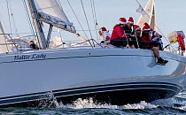 Sailors onboard a yacht sailing in the Sydney Harbour, New South Wales, Australia, November 2012. All non-editorial uses must be cleared individually.