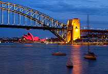 Sydney Harbour at night, looking towards the Opera House and Harbour Bridge, New South Wales, Australia, October 2012.