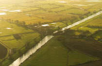 Aerial view of King's Sedgemoor Drain and agricultural land drying after winter floods, Somerset Levels, UK, February 2015.