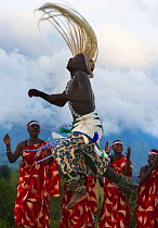 Local Intore dancer with straw headdress. Volcanoes National Park, Virungas,  Rwanda. February 2012.