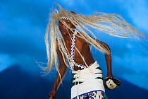 Local Intore dancer with straw headdress. Volcanoes National Park, Vinguas, Rwanda. February 2012.