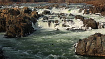 Kayaker on Great Falls, Potomac River, Virginia, USA, January 2013.