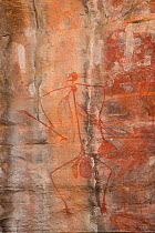 Aboriginal rock art of hunter, Kakadu National Park, Northern Territory, Australia. December 2012.