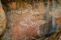 Aboriginal rock art of male figure, Kakadu National Park, Northern Territory, Australia. December 2012.