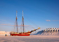 'Noorderlicht' (Northern lights) hotel boat, frozen into the ice in Sassenfjord, Svalbard, March 2013.