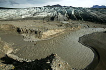 Glacier and muddy meltwater stream, Skaftafell National Park, south-east coast, Iceland, August 2003.