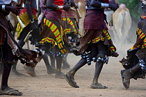 Women dancing at the Jumping of the bulls Hamer ceremony. This Hamer ceremony is a a right of passage into manhood for Hamer boys. During the ceremony young female relatives of the boys beg to be whip...