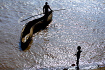 Wooden canoe crossing the Omo River, viewed from above. Territory of the Dassanech tribe. Lower Omo Valley. Ethiopia, November 2014