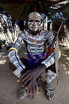 Karo man with decorative skin painting. Karo tribe, Omo river, Ethiopia, November 2014