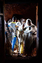 Christian worshipers at Bet Danaghel (part of the northwestern group of churches in Lalibela). UNESCO World Heritage Site. Lalibela. Ethiopia, December 2014.