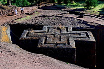 Bet Giyorgis Church, carved from solid limestone tufa rock, viewed from above to show the cross shape of the church. Lalibela. UNESCO World Heritage Site. Ethiopia, December 2014.