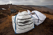 Moorland restoration works, carried out in partnership between Moors for the Future and Natural England to restore the eroded footpath along Derwent Edge, Eroded moorland surrounding the path is being...