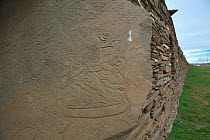 Carving of wrathful or guardian deity, Serxu, Shiqu county, Sichuan Province, Qinghai-Tibet Plateau, China. August 2010.