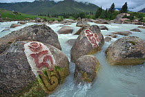 Mani stones in river, Serxu, Shiqu county, Sichuan Province, Qinghai-Tibet Plateau, China, August 2010.