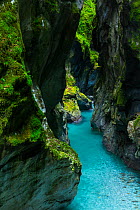 Clear blue water in river running through Tolmin Gorges, Soca Valley, Triglav National Park, Julian Alps, Slovenia, Europe