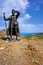 Statue of traveling man, Olkhon Island, Lake Baikal, Russia. June 2014.