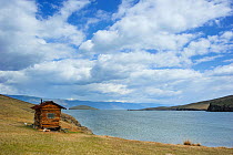 Small hut on the shore of Lake Baikal, Olkhon island, Lake Baikal, Russia, June 2014