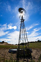 Windmill water pump on Amy and Lynn Ballagh's ranch in the Sandhills, Garfield County, Nebraska, USA.