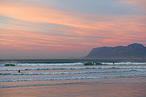 Sunrise over False Bay, Atlantic Ocean, Muizenberg Beach, near Cape Town, Western Cape, South Africa.
