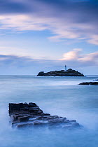 Godrevy Island and lighthouse, at dusk, Hayle, Cornwall, UK. October 2014.