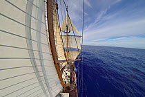 Fish eye view of sails of Corwith Cramer, 134-foot steel brigantine research vessel, Sargasso Sea, Bermuda, April.