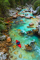 Group of Kayakers in the Soca river, Julian Alps, Bovec, Slovenia, October 2014.