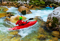 Kayak  in the Soca river, Julian Alps, Bovec, Slovenia, October 2014.