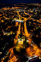 Aerial view of Tallinn, the Capital of Estonia at night, with Charles' Church in the foreground, Estonia, October 2013.