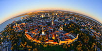 Aerial fisheye view Tallinn Old Town and City Centre at sunset. Harjumaa, Estonia, October 2013.