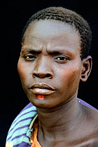 Woman from the Bodi tribe with chin decoration, Omo Valley, Ethiopia, March 2015.