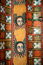 Details of the paintings of angels (cherubs) in the ceiling  of the Debre Birhan Selassie (Trinity and Mountain of Light) Church in the outskirts of Gondar, Amhara Region, Semien Gondar Zone, Ethiopia...