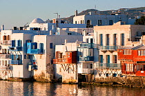 'Little Venice' and reflections of the houses in the sea water, Mykonos Town, Mykonos Island, Cyclades, Aegean Sea, Greece, August 2007.