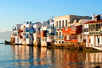 'Little Venice' and reflections of the houses in the sea water, Mykonos Town, Mykonos Island, Cyclades, Aegean Sea, Greece, August 2007.