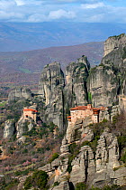 Two Greek Orthodox rock Monasteries  in Meteora. The Holy Monastery of Rousanou/St. Barbara (foreground right, founded in the middle of 16th century) and in the background the Holy Monastery of St. Ni...