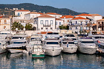 Luxury yachts docked in harbour, Spetses Island, Aegean Sea, Greece, Mediterranean, April 2009