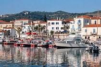 Red water-taxis docked in harbour, Spetses Island, Aegean Sea, Greece, Mediterranean, April 2009